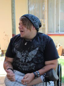 Jordan receiving his new all terrain wheelchair in Johannesburg